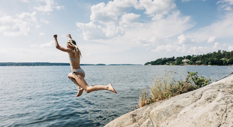 1252952764.Stockholm, swim, rocks, lake
1252952764
Getty, RFC, Stockholm, swim, rocks, lake, Adult, Clothing, Female, Jumping, Person, Shorts, Woman
Kid jumping from cliff into water in summer